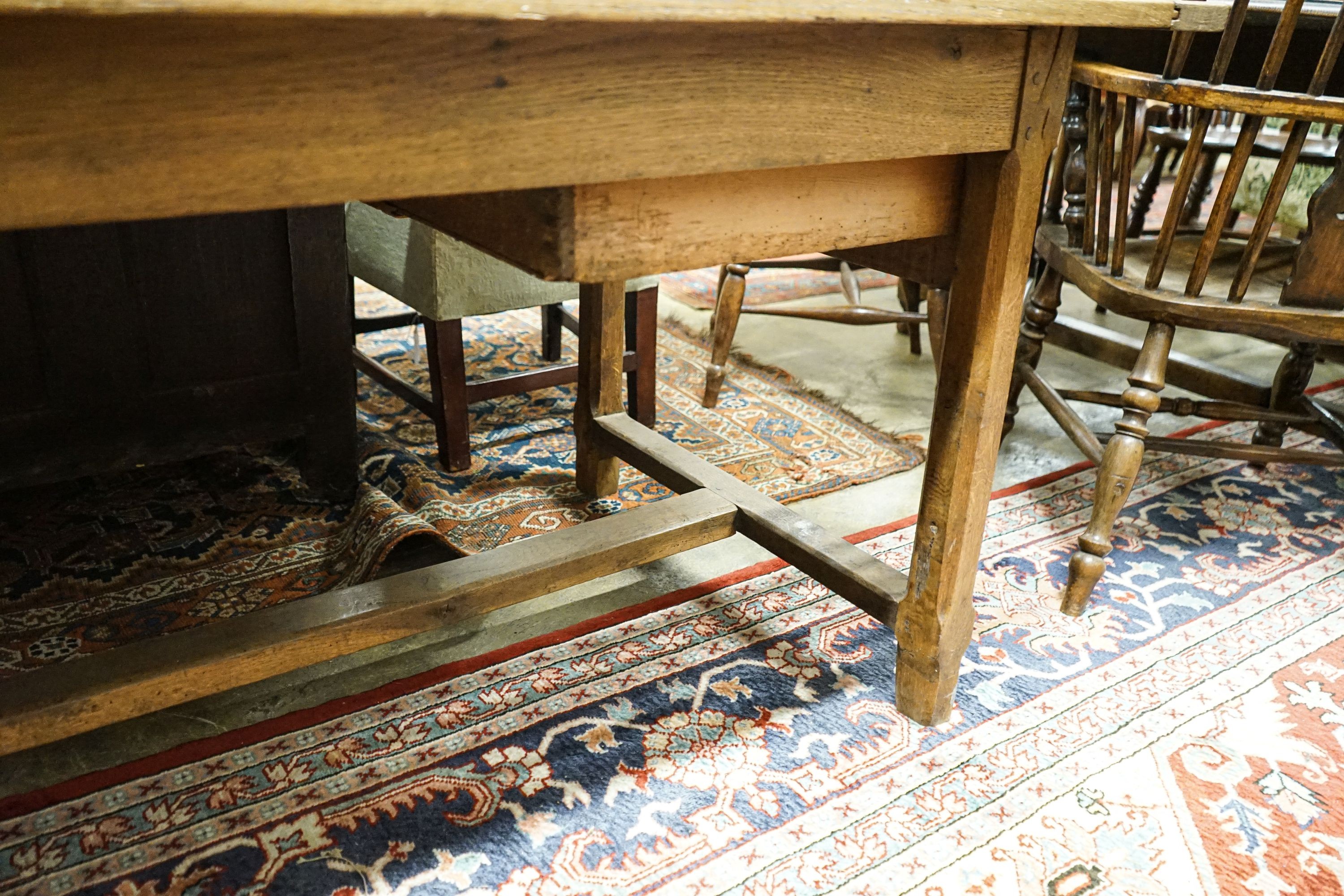 A Cotswold style oak and pine refectory table, with single pine drawer to one end, width 203cm, depth 80cm, height 73cm